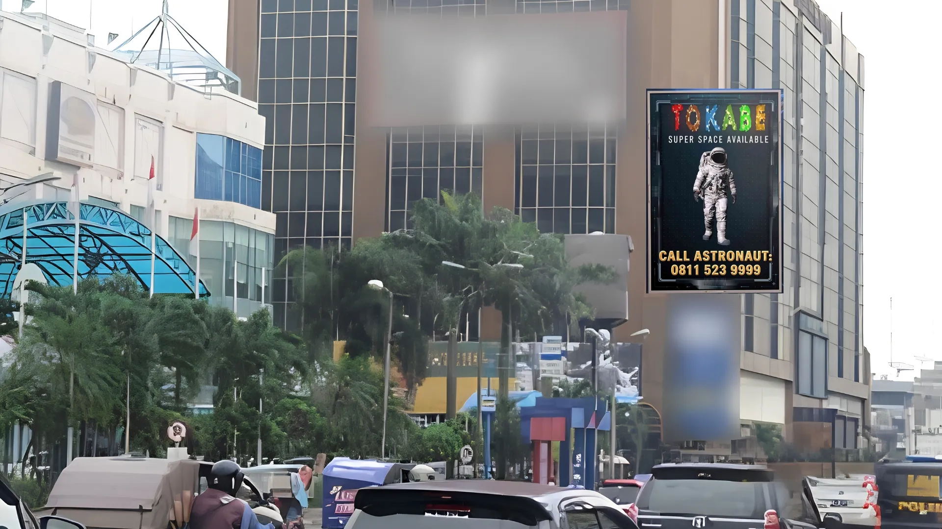 Layanan Videotron DOOH Tokabe.id - Jl. MT Haryono di Gedung Olympia Plaza - Videotron strategis Medan