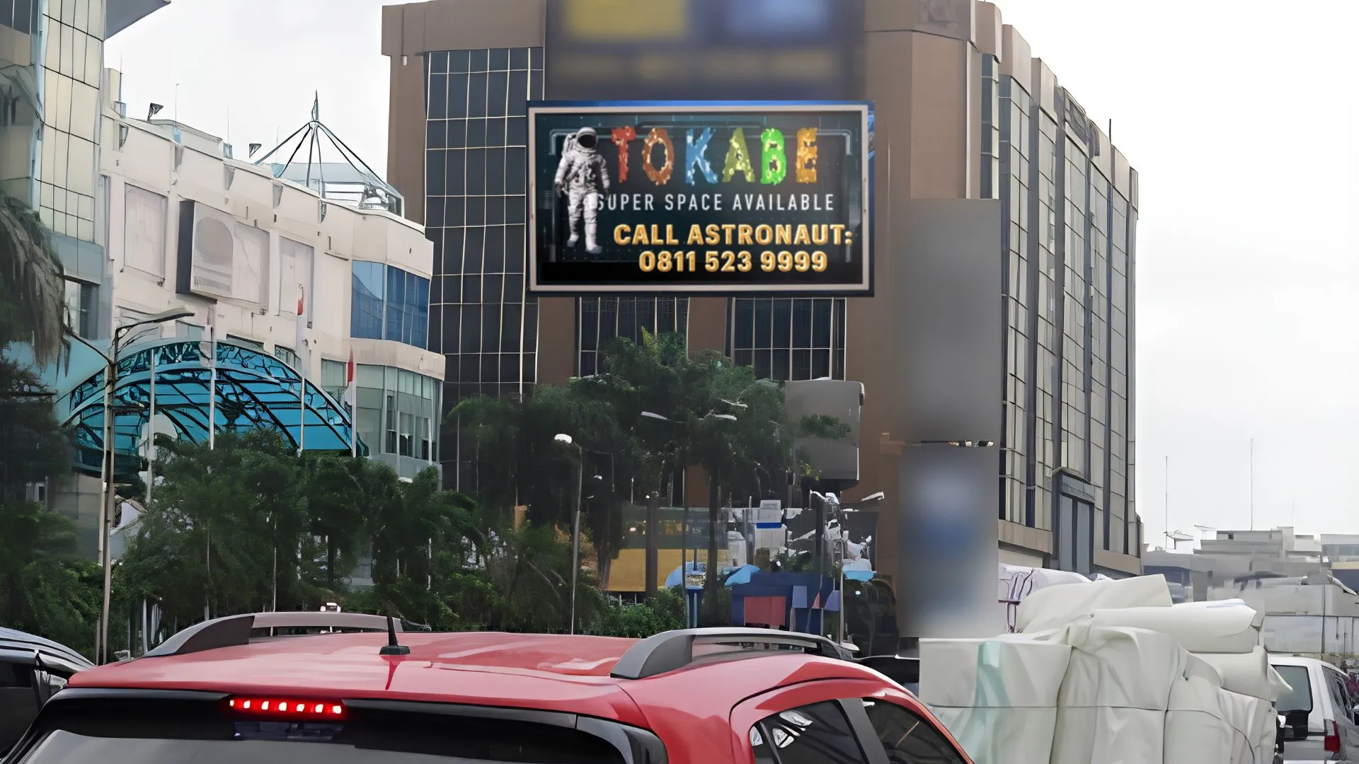 Sewa Reklame Billboard Tokabe.id - Jl. MT Haryono di Gedung Olympia Plaza - Titik billboard strategis Medan